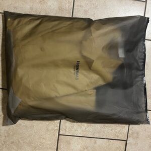 Fear of God Essentials Long Coat - Egg Yolk